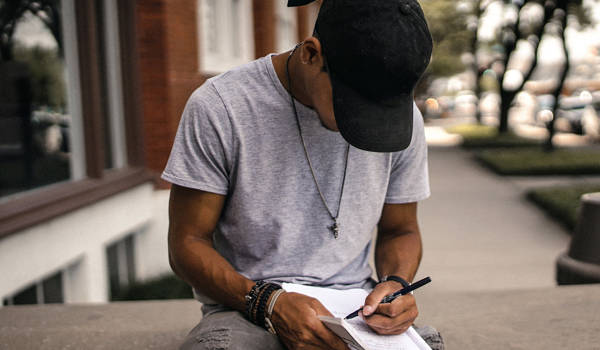 guy-studying-on-wall