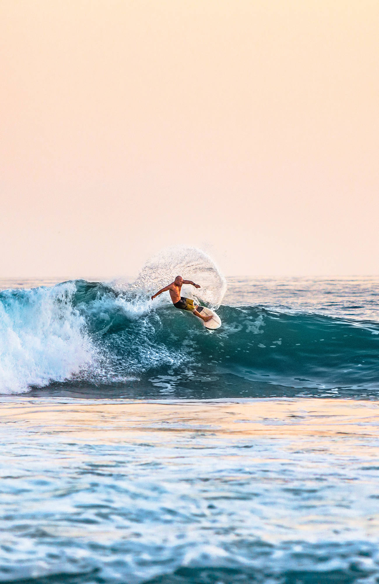 surfing-man-surfing-in-sunset-sidebar