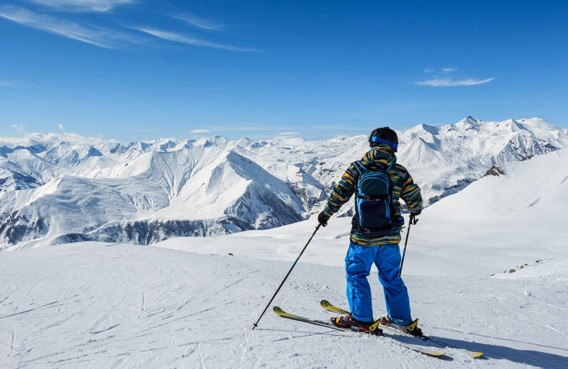 british-coumbia-canada-whistler-skier-on-top-of-mountain-cover