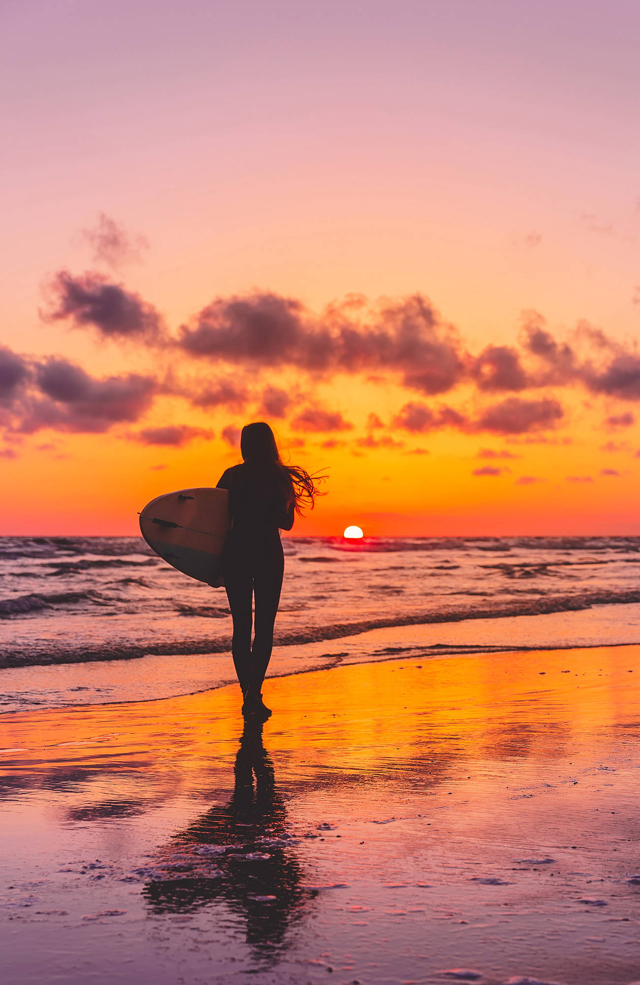 surfing-woman-with-surfboard-sunset-sidebar