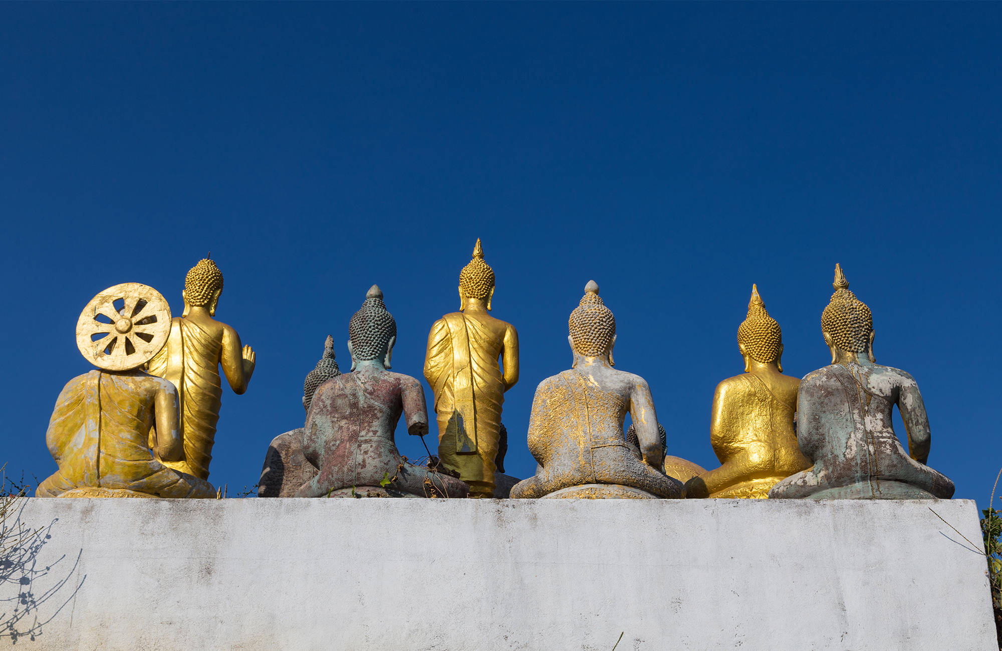 hua-hin-thailand-khao-takiab-temple-buddha-statues-cover