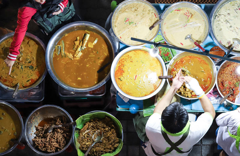 Streetfood being prepared on the streets of Bangkok in Thailand