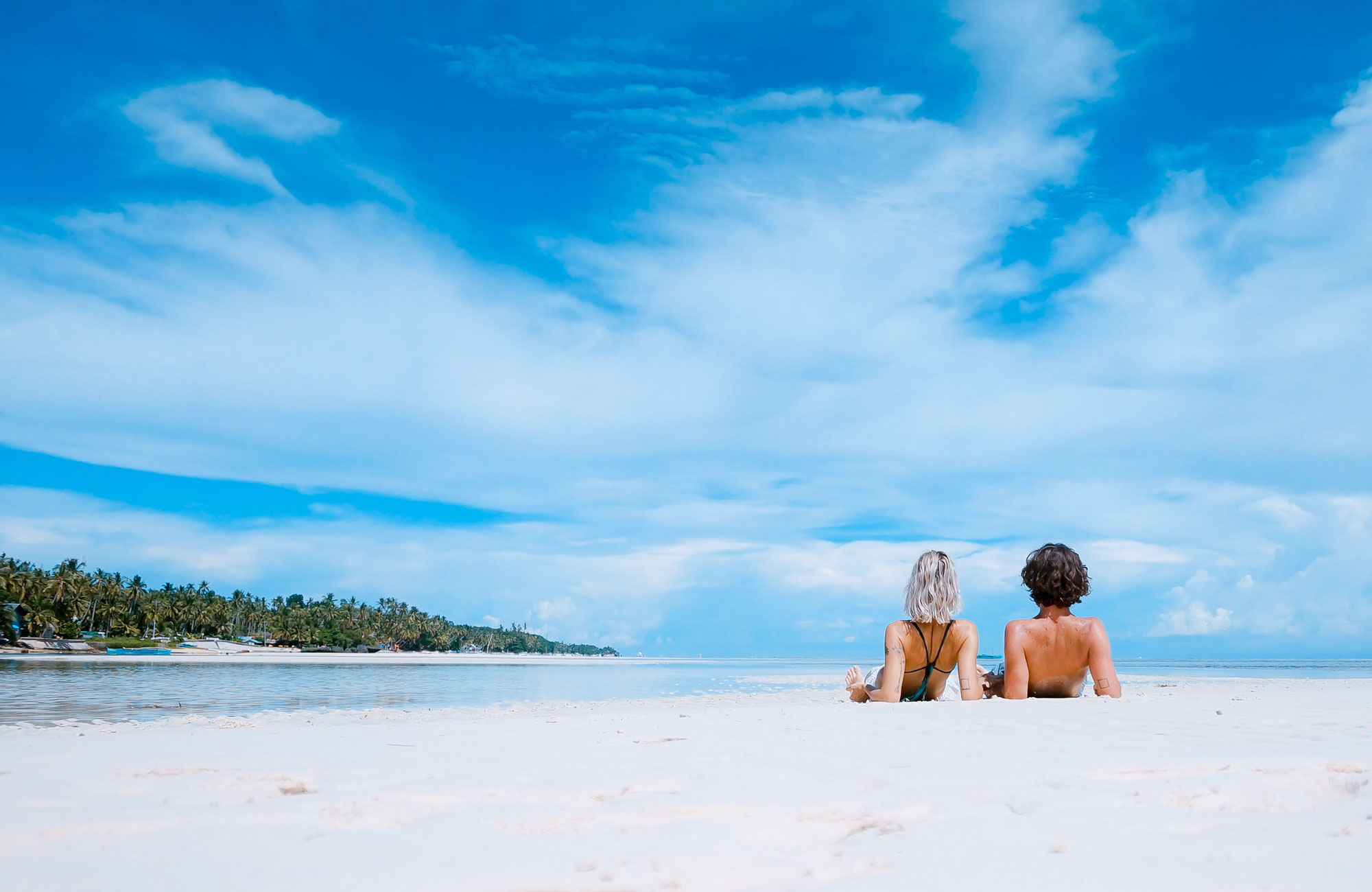 Inspirational Woman Man Chilling On Beach Zoom Out Cover