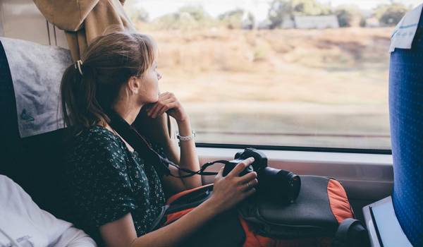 Interrail Woman Enjoying View From Train Seat