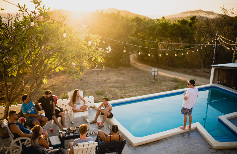 Friends Chilling By The Pool