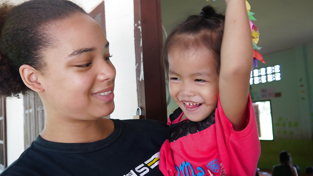 participant-holding-a-kid-3_1280x720